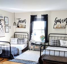 a bedroom with two twin beds and pictures on the wall