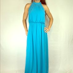 Gorgeous Bright Blue Color. Goddess Type Dress With Open And Draped Back As Shown. High Neck Collar Detail. Dress Has Pockets! Blue Sleeveless Chiffon Maxi Dress, Light Blue Sleeveless Chiffon Maxi Dress, Chic Flowy Light Blue Maxi Dress, Chic Light Blue Flowy Maxi Dress, Flowy Blue Chiffon Maxi Dress, Blue Chiffon Evening Dress For Summer, Chic Blue Maxi Length Chiffon Dress, Elegant Blue Flowy Chiffon Dress, Blue Sleeveless Chiffon Beach Dress