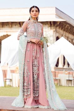 Beautiful embroidered party net outfit is presented for party and wedding wear. This elegant addition to your party and wedding wear will give you great self confidence. Shirt: This elegant attire in pink color is showing its grace with nicely embroidered and sequinned front and back for shirt.Neckline and sleeves are also heavily embroidered and sequinned with motifs. Sheesha work with sequins is giving an alluring touch at this attire. This outfit has beautiful finishing with net embroidered b Net Outfit, Latest Pakistani Dresses, Pakistani Dresses Online, Fancy Shirt, Pakistani Designer Suits, Elegant Attire, Maria B, Pakistani Wedding Dresses, Pakistani Dress Design