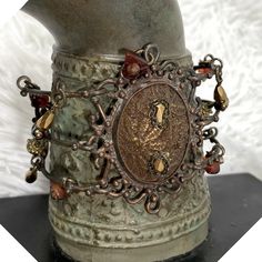 In Good Pre-Owned Vintage Condition. This Unique Piece Was My Grandmother’s. She Had Amazing Flair And Loved True Vintage Bohemian Style Jewelry. This Is A Delicate Piece So Needs To Be Treated With Care. Maya Vintage Rustic Beaded Wire Cuff Bracelet Brocade Center Crystals Handmade - Wire Work - Hand Beaded Stones, Crystals - Center “Stone” Is Covered With A Brocade Type Cloth. (Difficult To See In The Photos) - Hinged - Adjustable - Hook Closure Elegant Brown Metal Cuff Bracelet, Vintage Bronze Beaded Bracelets, Vintage Beaded Bronze Bracelets, Brown Beaded Bangle Cuff Bracelet, Brown Beaded Cuff Bracelet Bangle, Brown Beaded Cuff Bracelet, Adjustable Vintage Bronze Beaded Bracelets, Brown Metal Bracelets For Festivals, Vintage Brown Beaded Bracelets For Festival