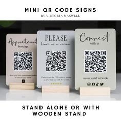 three cards with qr code on them sitting next to each other in front of a white background