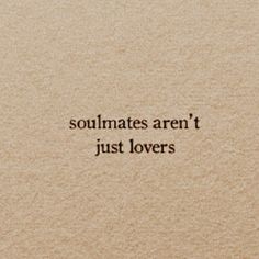 the words soulmates aren't just lovers are written in black on a beige background