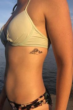 The Art of Travel: Exploring the World of World Traveler Tattoos Small Travel Tattoos, Tattoo Ideas Travel, Watercolor Bike, Tattoos For Women Unique, Small Mountain Tattoo, Travel Tattoo Ideas, Moon Globe