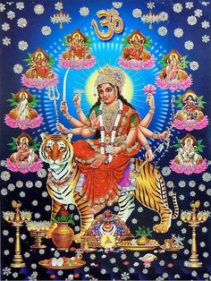 the hindu god sitting on top of a tiger surrounded by other deities and symbols,