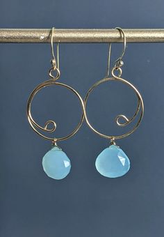 "Aqua Blue Chalcedony Loop Wire Wrapped 24 K Gold Filled Earrings, Chandelier Earrings. Total length: approx 2 1/5\" ( 56 mm) * Processing time is 3 - 5 days.  * US orders are shipped first class mail. * International orders are shipped first class international. * Shipping upgrades are available at checkout. Thank you for visiting my listing! Have a wonderful day!" Blue Teardrop Wire Wrapped Chandelier Earrings, Blue Wire Wrapped Chandelier Earrings, Blue Wire-wrapped Dangle Hoop Earrings, Blue Wire Wrapped Dangle Hoop Earrings, Blue Wire Wrapped Round Earrings, Blue Wire-wrapped Round Earrings, Blue Round Chandelier Earrings For Party, Wire Jig, Beach Jewelry Boho