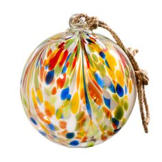 a colorful glass ornament hanging from a rope