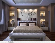 a bedroom with a large bed and lots of lights on the wall above it's headboard