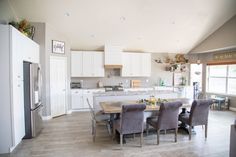 the kitchen is clean and ready to be used for dinner or other entertaining purposes in someone's home