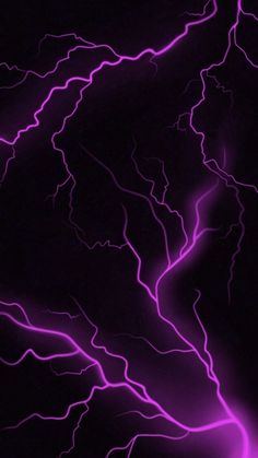 an image of purple lightning in the dark