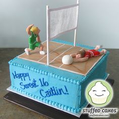 a birthday cake for a boy who is playing tennis with his friend on the court