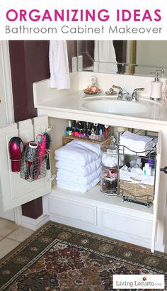 the bathroom cabinet is organized with towels and other things to keep in it's place