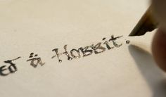 someone writing on paper with a pen and eraser next to it that says, what is horsit?