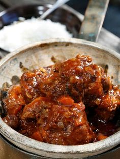 a close up of a bowl of food on a table