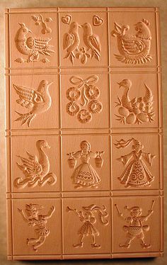 a close up of a tile with different designs on it