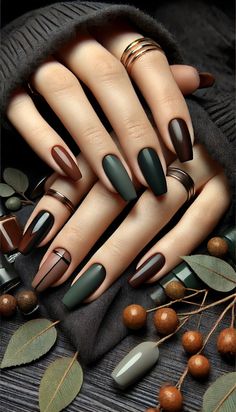 Get into the autumn mood with these dark and moody nail shades. Think rich browns, deep greens, and smoky greys that are perfect for cool days. #MoodyNails #AutumnTrends  #FallNails #MoodyColors #AutumnBeauty #DarkNails #TrendyNails2024 Alternate Color Nails, Nail Ideas Dark Colors Art Designs, Deep Fall Nails, Dark Fall Acrylic Nails, Dark Thanksgiving Nails, Autumn Nails Green And Brown, Moody Nail Colors, Black November Nails, Grunge Fall Nails