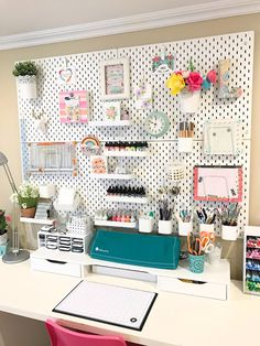 a white desk topped with lots of drawers