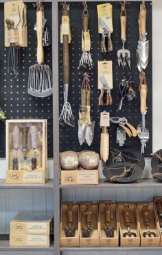 there are many different types of tools on the shelves in this store that is filled with items