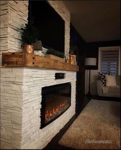 a living room with a fire place in it