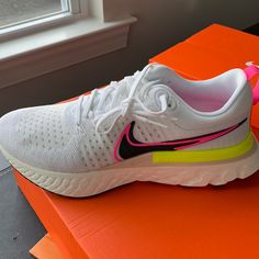 New, Never Worn Running Shoes In Box! White Nike React Infinity Flyknit 2 Sneakers With Bright Neon Pink And Yellow Accents Run This Summer In Style! Great Neutral Running Shoe For Those Who Want A Touch Of Stability And A Lot Of Cushion For Long And Recovery Runs White/Black/Pink Blast/Sail Coloring Track Shoes, Neutral Running Shoes, Nike React, Yellow Accents, Nike Womens, White Nike, Running Shoes Nike, Pink And Yellow, New Nike