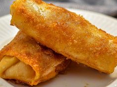 two fried food items on a white plate