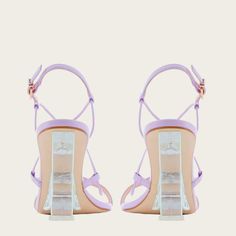 Description: Lilac leather sandal with barely-there straps Statement wedge heel, with lucite wing design accented in mint Open toe Details: 85MM Heel Upper: 100% leather Sole: 100% leather Fit: True to size Care for Paloma: Store in dust bags to maintain appearance Gently buff affected area with a soft cloth to remove marks Leather soles may become damaged if wet Keep out of the rain Wing Design, Luxury Footwear, Wings Design, Sophia Webster, Enamel Paint, The Butterfly, Paloma, Luxury Shoes, Black Sandals