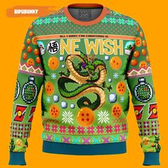 a green sweater with an image of a snake on it and the words one wish