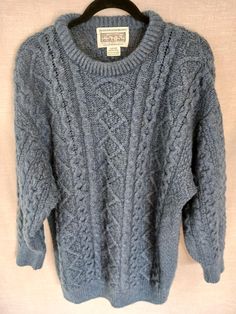 This is a Vintage Aran !00% Merino Wool Cable Knit Crewneck Pullover Sweater Sz M. Made on the Aran Island in Ireland it has been gently worn and is in like new condition. Measurements Length 32" Shoulders 26" Sleeves 23" Chest 48" Icelandic Wool Sweaters, Cableknit Sweater, Aran Sweater, Fisherman Sweater, Fair Isle Sweater, Gray Sweater, Knit Crewneck, Oversized Sweater, Grey Sweater