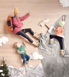 an overhead view of two children climbing up a mountain