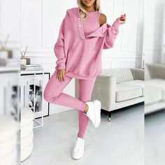 This Cozy Hooded Button Detailing Lounge Set is perfect for both comfort and style, offering a comfortable yet fashionable look. With its soft fabric and laid-back design, this set is ideal for casual days at home or running errands, providing a blend of warmth and ease. Made from a soft, durable fabric that ensures long-lasting comfort. Features a roomy hood with a button closure for added style and warmth. The top is designed with a loose fit, making it perfect for layering or wearing on its o Celana Fashion, Button Hoodie, Solid Hoodie, Leisure Suit, Hoodie Set, Estilo Chic, Suit Style, Tracksuit Set, Loose Outfit