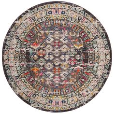 a round rug with an intricate design on the top and bottom, in various colors