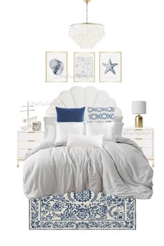 a white bed with blue and white pillows