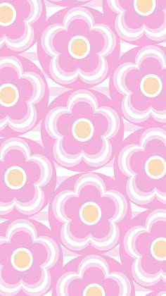 a pink and white flower pattern with circles