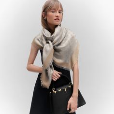 This sophisticated shawl, woven with a tone-on-tone monogram pattern, is given a subtle shimmer by the use of a soft shine yarn. Lv Scarf, Shawl Outfit, Louis Vuitton Scarf, Louis Vuitton Official Website, Scarf Outfit, Louis Vuitton Accessories, Fur Scarf, Louis Vuitton Official, Luxe Fashion