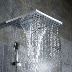 a shower head with water running down it