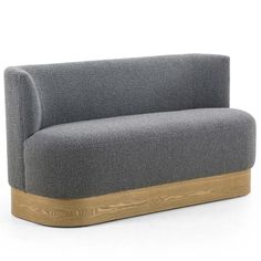 a gray couch with wooden legs on a white background