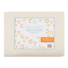 the quilter's best blend mattress pad is shown in white and yellow stars