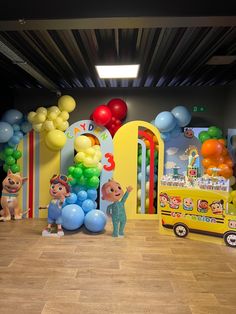 children's birthday party with balloons and toys