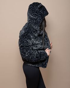 Women's Hooded Puffer Jacket - Classic Turn your outfit up a notch in this leopard print puffer jacket for women. We took the classic puffer jacket and elevated it with some animal print faux fur. Featuring a velvety soft feel, a hood with ears, and a dark slate leopard print, this standout jacket will be your go-to piece when the temperature drops. Made with cruelty-free, vegan materials, it's as responsible as it is stylish. Enjoy it out with friends, on the mountain, or at any winter destinat Hooded Leopard Print Winter Outerwear, Fall Leopard Print Hooded Outerwear, Hooded Leopard Print Outerwear For Fall, Grey Leopard, Hooded Puffer Jacket, Black Leopard Print, Puffer Jacket Women, Classic Jacket, Fake Fur