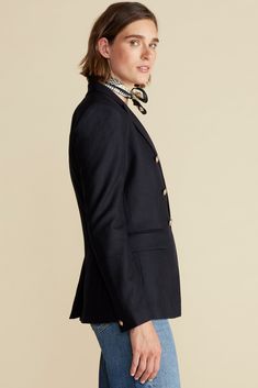 A sleek, tailored blazer with notched lapels, flap pockets, and gold-toned buttons adds distinctive style to a classic wardrobe.Double-breasted blazer with notched lapel, welt pockets, and gold buttons on front and cuffsSlim fit70% RWS Virgin Wool, 25% Polyamide, 5% Recycled Cashmere woven in Italy100% Recycled Polyester lining27 1/2" in lengthRuns narrow through the sleeve. Size up for a roomier fit Ethically Made in China Luxury Navy Blazer With Double Button Closure, Navy Double-breasted Blazer, Elegant Navy Double-breasted Blazer, Luxury Navy Double-breasted Blazer, Navy Notch Lapel Blazer With Double-breasted Button Fastening, Recycled Cashmere, Tailored Blazer, Classic Wardrobe, Dark Navy Blue