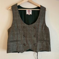 Nwot Vintage Style Tweed Waistcoat With Large Coat Of Arms Detailed Brass Functional Buttons. This Handmade Waistcoat Has A Corset Effect In The Back For A Perfect Fit Which Can Be Used To Adjust The Size. The String In The Back Is Made From Raw Jute And Cotton. This Textile Of The Waistcoat Was Chosen Because Of Its High Quality And You Can See The Weave Of The Tweed. Fabric Is Woollen Tweed. Textile Makeup Is 70% Wool And 30% Polyester Tweed Waistcoat Ladies, Vintage Tweed Vest For Work, Winter Tweed Vest For Work, Winter Workwear Tweed Vest, Tailored Tweed Vest For Fall, Tweed Vest For Workwear In Fall, Tweed Vest With Buttons For Work, Tweed Waistcoat, Green And Brown