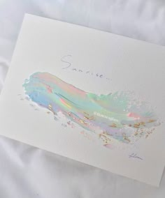 a card with an abstract painting on it