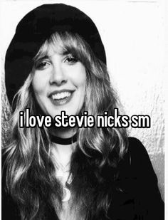 a woman with long hair wearing a black hat and smiling at the camera text reads i love steve nicksm