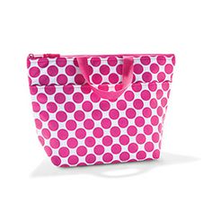 a pink and white polka dot tote bag on a white background with the handle down