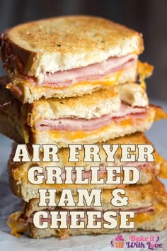 three grilled ham and cheese sandwiches stacked on top of each other with the words air fryer grilled ham and cheese