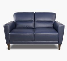 a blue leather loveseat on a white background