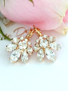 Bridal Cluster Earrings, Drop Earrings, Swarovski Earrings, Bridesmaids Earrings,Gift for Her,Rose Gold Earrings, Bridal Crystal Earrings Matching Jewelry : http://etsy.me/1PP13ND http://etsy.me/1i6n9xB http://etsy.me/1jIzXvV A cluster of marquise crystals and diamond cut crystal, Set on Swarovski Settings Designed by Ilona Rubin. Petite Delights is an Official SWAROVSKI® Branding Partner Official Swarovski Elements® Partner Made with real genuine high quality Austrian Swarovski ©Crystal . Our b Gold Earrings Bridal, Bridal Drop Earrings, Bridesmaid Gifts Earrings, Bridesmaids Earrings, Droplet Earrings, Crystal Bridal Earrings, Bridal Earrings Drop, Matching Jewelry, Swarovski Earrings