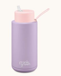 a purple and pink water bottle with the words frank green on it's side