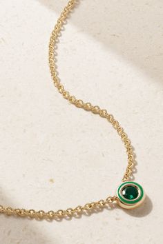 Alison Lou's necklace is part of the 'Madison' collection, which includes delicate pieces featuring a range of colorful stones in varying cuts - it's also the street name of the label's boutique. It's handmade from 14-karat gold and strung with a faceted round-cut emerald framed by tonal glossy enamel. May Birthstone Cable Chain Pendant Jewelry, Luxury Green Jewelry With Adjustable Chain, Green Fine Jewelry With Adjustable Chain, Green Luxury Jewelry With Adjustable Chain, Green Round Pendant Jewelry With Bezel Setting, Gold Enamel Pendant Necklace, Elegant Enamel Necklaces With Gemstone, Gold Enamel Necklace With Cabochon, Luxury Gold Enamel Necklace