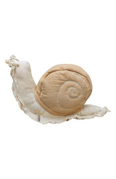 a close up of a snail pillow on a white background with an open shell in the middle