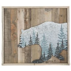 the bear is standing in front of wood planks with trees painted on it's side